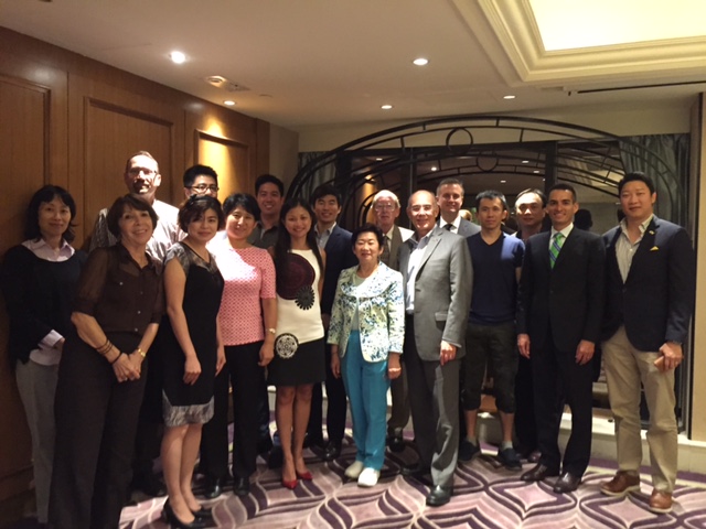 Dr. Sue Van, Hon. PhD Georgia Tech (pictured center), stands with Dr. Rafael Bras to her left, along with members of Georgia Tech's development team, and Georgia Tech alumni living in Hong Kong. 