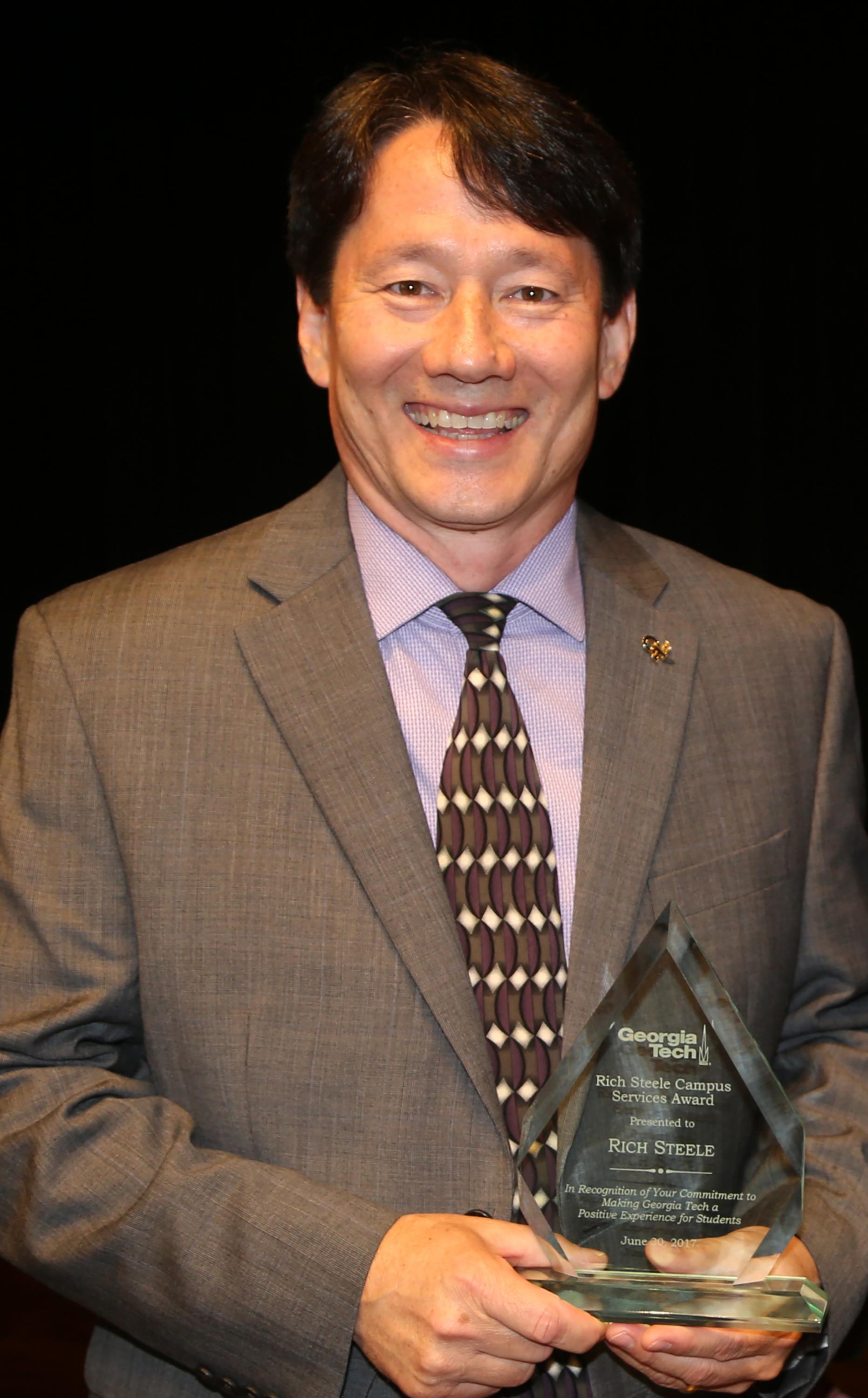 Picture of Rich Steele with Award